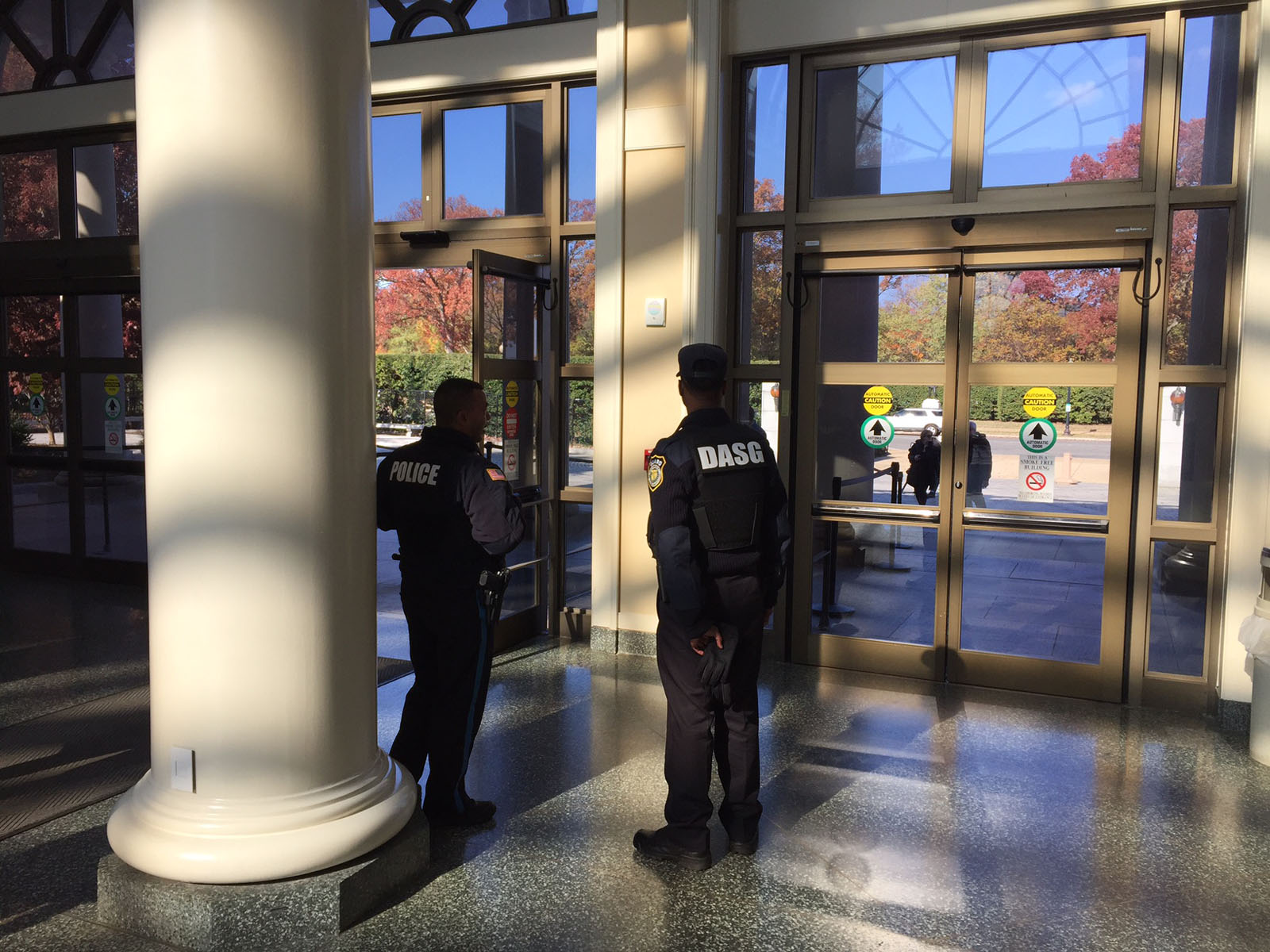 Police officers stationed inside the welcome center. (WTOP/John Aaron)