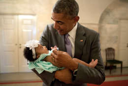 President Barack Obama holds the baby daughter of former staff members Darienne Page Rakestraw and London Rakestraw in the Ground Floor Corridor of the White House, July 1, 2014. (Official White House Photo by Pete Souza)

This official White House photograph is being made available only for publication by news organizations and/or for personal use printing by the subject(s) of the photograph. The photograph may not be manipulated in any way and may not be used in commercial or political materials, advertisements, emails, products, promotions that in any way suggests approval or endorsement of the President, the First Family, or the White House.