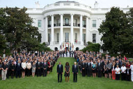 President Barack Obama, First Lady Michelle Obama and Vice President Joe Biden join White House staff on the South Lawn of the White House to observe a moment of silence marking the 13th anniversary of the 9/11 attacks, Sept. 11, 2014. (Official White House Photo by Chuck Kennedy)

This official White House photograph is being made available only for publication by news organizations and/or for personal use printing by the subject(s) of the photograph. The photograph may not be manipulated in any way and may not be used in commercial or political materials, advertisements, emails, products, promotions that in any way suggests approval or endorsement of the President, the First Family, or the White House.