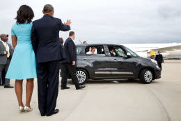 Sept. 22, 2015
"Following their brief meeting with Pope Francis at Joint Base Andrews, the President and First Lady wave as the Pope drives away in a small Fiat." (Official White House Photo by Pete Souza)
This official White House photograph is being made available only for publication by news organizations and/or for personal use printing by the subject(s) of the photograph. The photograph may not be manipulated in any way and may not be used in commercial or political materials, advertisements, emails, products, promotions that in any way suggests approval or endorsement of the President, the First Family, or the White House.