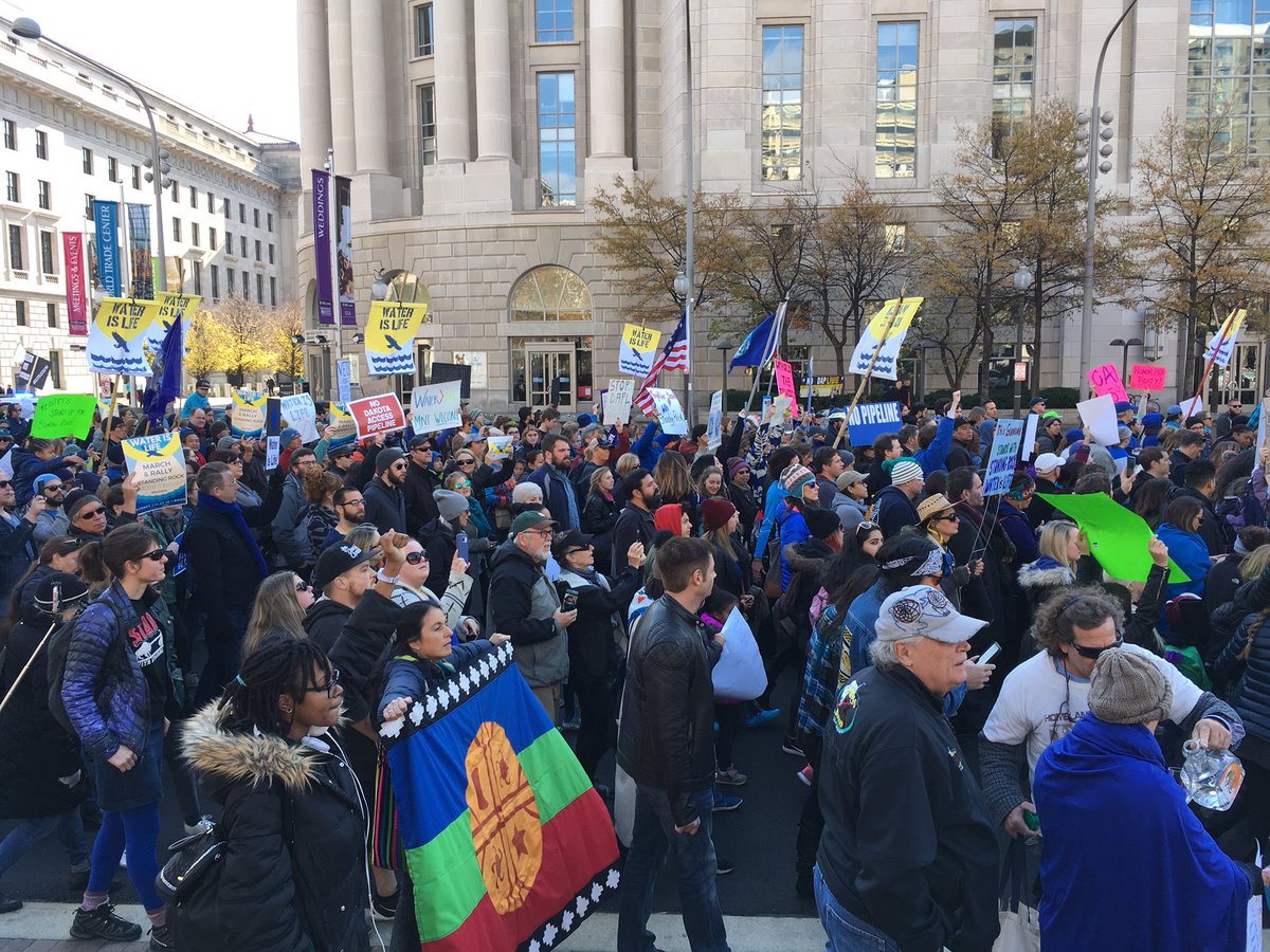 Protesters against the Dakota Access Pipeline march from the Justice Department to the Washington Monument on Sunday. (WTOP/Liz Anderson)
