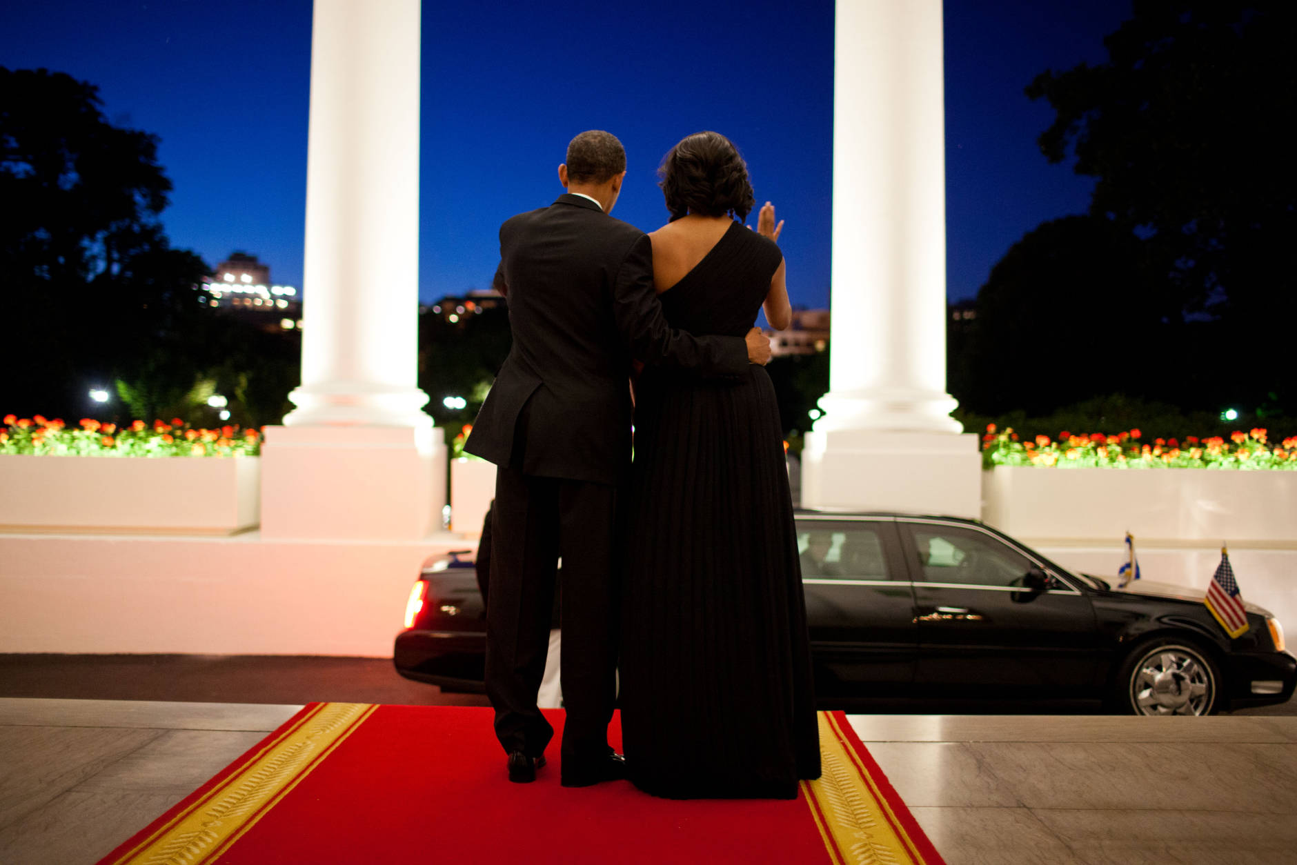 President Barack Obama and First Lady Michelle Obama wave goodbye to President Shimon Peres of Israel on the North Portico of the White House following the Presidential Medal of Freedom ceremony and dinner in his honor, June 13, 2012. (Official White House Photo by Pete Souza)

This official White House photograph is being made available only for publication by news organizations and/or for personal use printing by the subject(s) of the photograph. The photograph may not be manipulated in any way and may not be used in commercial or political materials, advertisements, emails, products, promotions that in any way suggests approval or endorsement of the President, the First Family, or the White House.