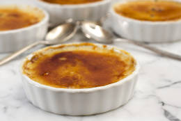 This Oct. 24, 2010 photo shows fresh ginger creme brulee. Shake things up for Thanksgiving dessert with this tasty creme brulee recipe. The custard can be done a day ahead and the candy coating for the top quickly made as dinner dishes are cleared. (AP Photo/Larry Crowe)