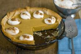 This Oct. 17, 2011 photo shows pumpkin pie with whipped cream in Concord, N.H. This recipe, from Rocco DiSpirito, can be made a day in advance of your Thanksgiving feast.    (AP Photo/Matthew Mead)