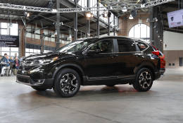 This Wednesday, Oct. 12, 2016, photo shows the 2017 Honda CR-V, in Detroit. America's family car is no longer the Toyota Camry or some other midsize car. It's the Honda CR-V, a compact SUV, that's getting its first overhaul since 2012. (AP Photo/Paul Sancya)