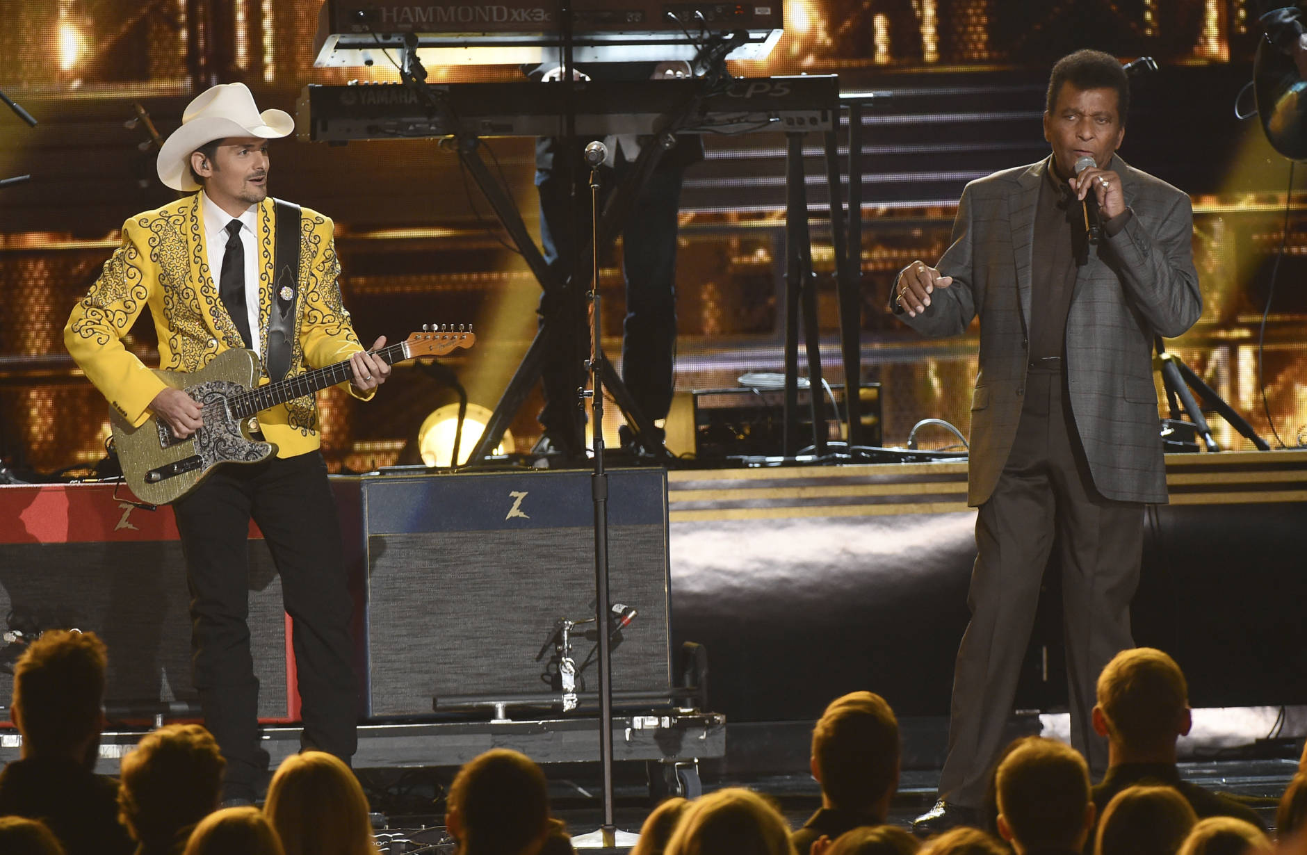 Brad Paisley, left, and Charley Pride perform "Kiss An Angel Good Morning" at the 50th annual CMA Awards at the Bridgestone Arena on Wednesday, Nov. 2, 2016, in Nashville, Tenn. (Photo by Charles Sykes/Invision/AP)