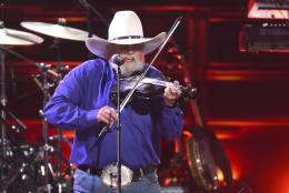 Charlie Daniels performs " The Devil Went Down To Georgia" at the 50th annual CMA Awards at the Bridgestone Arena on Wednesday, Nov. 2, 2016, in Nashville, Tenn. (Photo by Charles Sykes/Invision/AP)