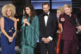Little Big Town, from left, Kimberly Schlapman, Karen Fairchild, Jimi Westbrook, and Phillip Sweet accept the award for vocal group of the year at the 50th annual CMA Awards at the Bridgestone Arena on Wednesday, Nov. 2, 2016, in Nashville, Tenn. (Photo by Charles Sykes/Invision/AP)