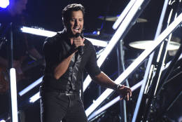 Luke Bryan performs "Move" at the 50th annual CMA Awards at the Bridgestone Arena on Wednesday, Nov. 2, 2016, in Nashville, Tenn. (Photo by Charles Sykes/Invision/AP)