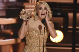Carrie Underwood accepts the award for female vocalist of the year at the 50th annual CMA Awards at the Bridgestone Arena on Wednesday, Nov. 2, 2016, in Nashville, Tenn. (Photo by Charles Sykes/Invision/AP)