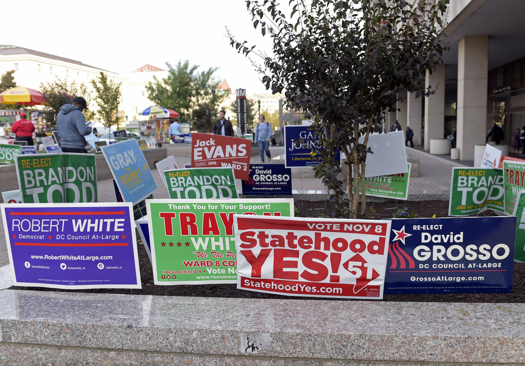 In this photo taken Nov. 3, 2016, signs supporting DC statehood are on display outside an early voting place on in Washington, Thursday, Nov. 3, 2016. Voters in the nation's capital will decide next week whether they want their city to become the nation's 51st state.
The referendum backed by Democratic Mayor Muriel Bowser is expected to pass easily. But even staunch statehood supporters say they’re not sure of the path forward. (AP Photo/Susan Walsh)