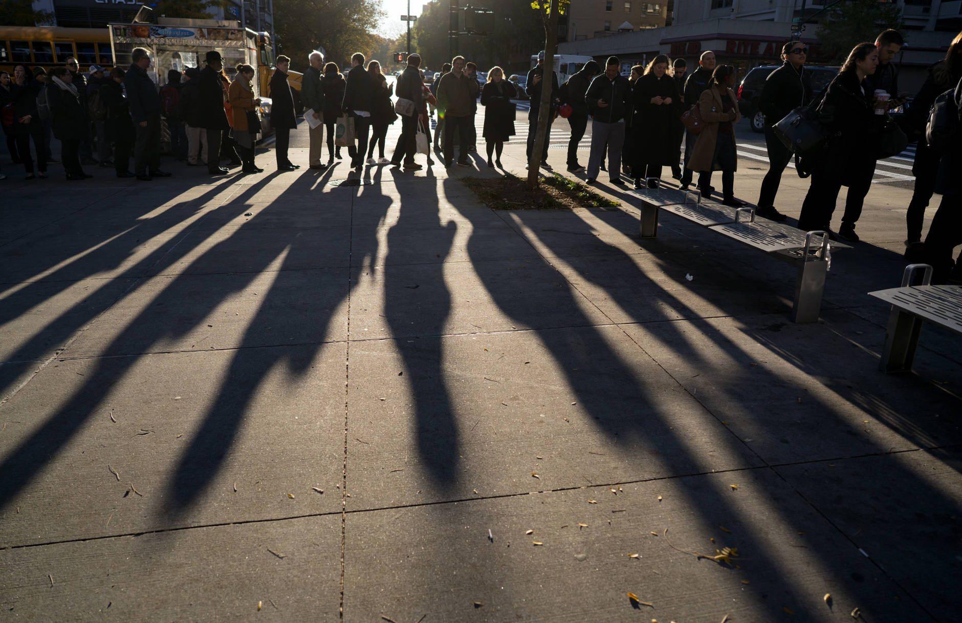 A line forms as people wait to vote on Election Day in the Upper West Side of Manhattan on Tuesday, Nov. 8, 2016, in New York. (AP Photo/Craig Ruttle)
