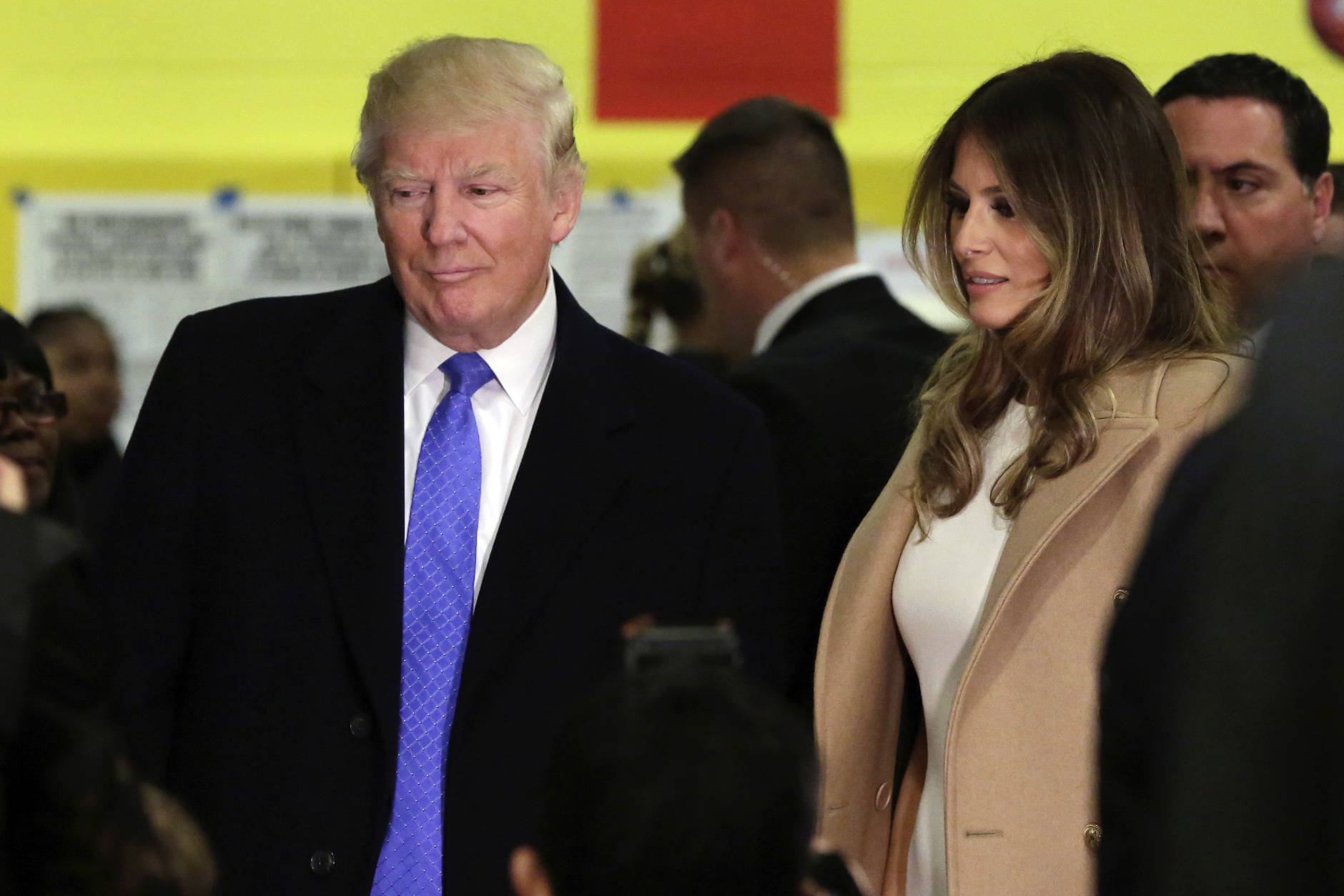 Republican presidential candidate Donald Trump and his wife Melania prepare to leave after voting, in New York, Tuesday, Nov. 8, 2016. (AP Photo/Richard Drew)