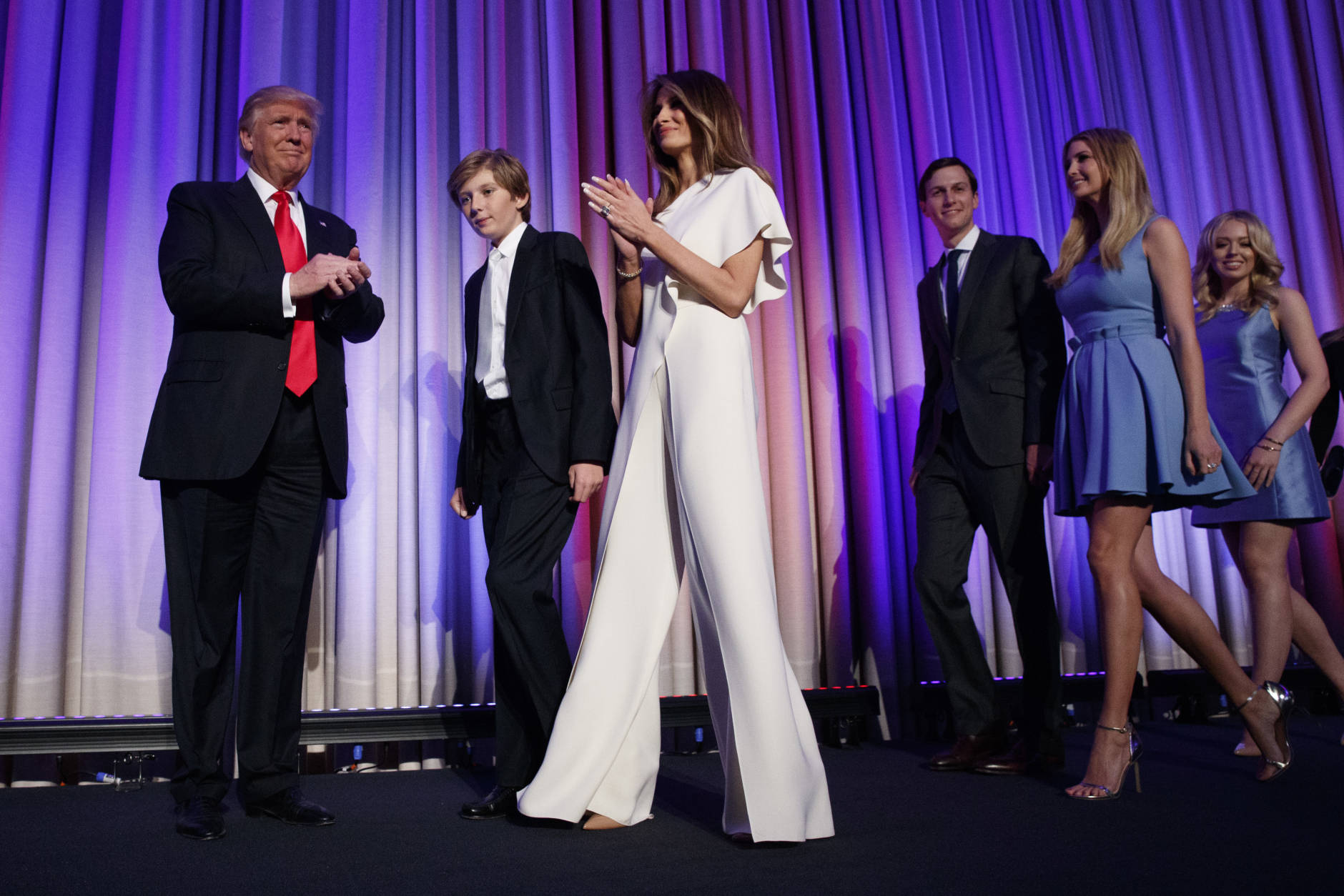 Republican presidential candidate Donald Trump, left, arrives to speak to an election night rally, Wednesday, Nov. 9, 2016, in New York. From left, Trump, his son Barron, wife Melania, Jared Kushner, Ivanka Trump, and Tiffany Trump. (AP Photo/ Evan Vucci)