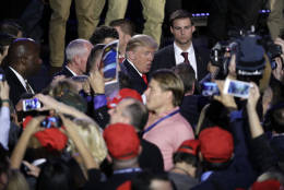President-elect Donald Trump shakes hands with supporters after giving his acceptance speech during his election night rally, Wednesday, Nov. 9, 2016, in New York. (AP Photo/John Locher)