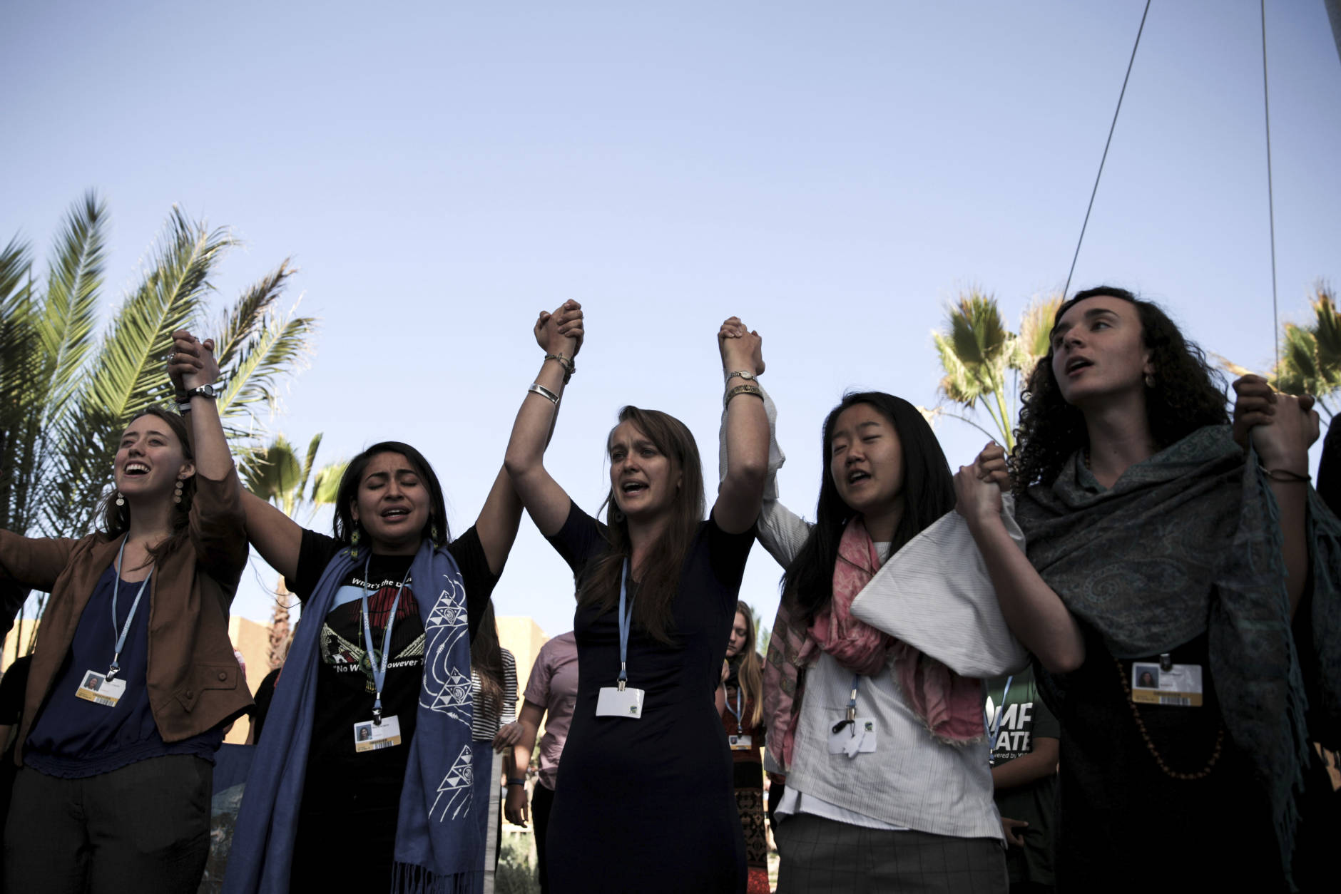 Environmental activists stage a protest against President-elect Donald Trump at the Climate Conference, known as COP22, in Marrakech, Morocco, Wednesday, Nov. 9, 2016. The election of a U.S. president who has called global warming a "hoax" alarmed environmentalists and climate scientists and raised questions about whether America, once again, would pull out of an international climate deal. (AP Photo/Mosa'ab Elshamy)