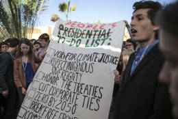 Environmental activists hold a banner during a protest against President-elect Donald Trump at the Climate Conference, known as COP22, in Marrakech, Morocco, Wednesday, Nov. 9, 2016. The election of a U.S. president who has called global warming a "hoax" alarmed environmentalists and climate scientists and raised questions about whether America, once again, would pull out of an international climate deal. (AP Photo/Mosa'ab Elshamy)