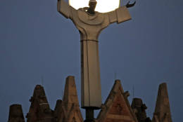 The moon rises behind St. Benedict The Moor Catholic church in Pittsburgh Saturday, Nov. 12, 2016. The Supermoon on November 14, 2016, will be the closest a Full Moon has been to Earth since January 26, 1948. The next time a Full Moon is even closer to Earth will be on November 25, 2034. (AP Photo/Gene J. Puskar)