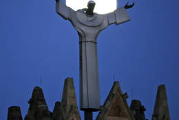 The moon rises behind St. Benedict The Moor Catholic church in Pittsburgh Saturday, Nov. 12, 2016. The Supermoon on November 14, 2016, will be the closest a Full Moon has been to Earth since January 26, 1948. The next time a Full Moon is even closer to Earth will be on November 25, 2034. (AP Photo/Gene J. Puskar)