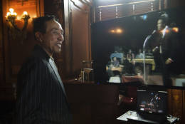 Gershwin Prize recipient Smokey Robinson talks with Matt Barton, curator for recorded sound at the Library of Congress, while watching a video showing artists performing his music, while visiting the Library in Washington, Tuesday, Nov. 15, 2016. (AP Photo/Molly Riley)
