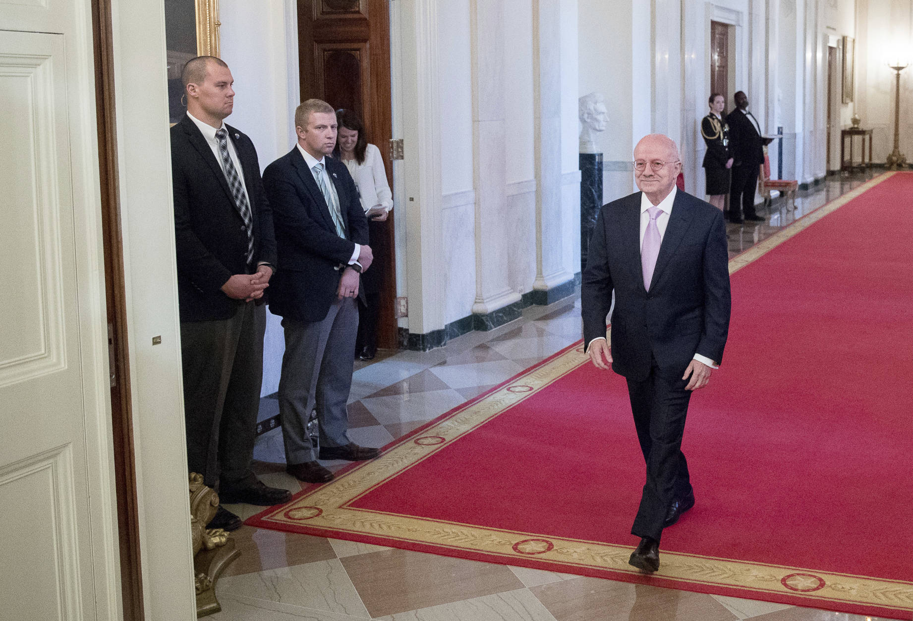 Miami Dade College President Eduardo Padron, right, arrives for a Presidential Medal of Freedom ceremony in the East Room of the White House, Tuesday, Nov. 22, 2016, in Washington. Obama is recognizing 21 Americans with the nation's highest civilian award, including giants of the entertainment industry, sports legends, activists and innovators. (AP Photo/Andrew Harnik)