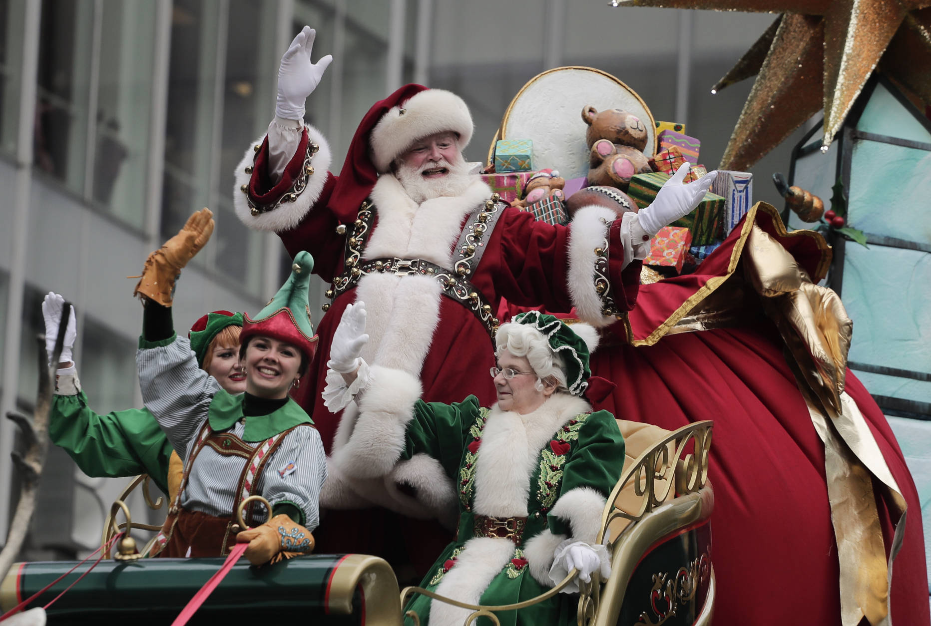 Santa Claus waves from his float as he passes along Sixth Avenue during the Macy's Thanksgiving Day parade, Thursday, Nov. 24, 2016, in New York. (AP Photo/Julie Jacobson)