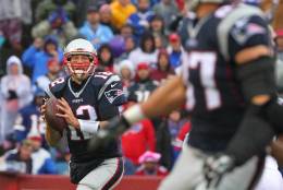 New England Patriots quarterback Tom Brady (12) looks at Rob Gronkowski (87) before throwing an incomplete pass during the first half of an NFL football game against the Buffalo Bills Sunday, Oct. 30, 2016, in Orchard Park, N.Y. (AP Photo/Bill Wippert)