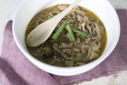 This Aug. 26, 2013 photo shows Shiitake mushroom ginger noodle soup with garlic pork in Concord, N.H. (AP Photo/Matthew Mead)