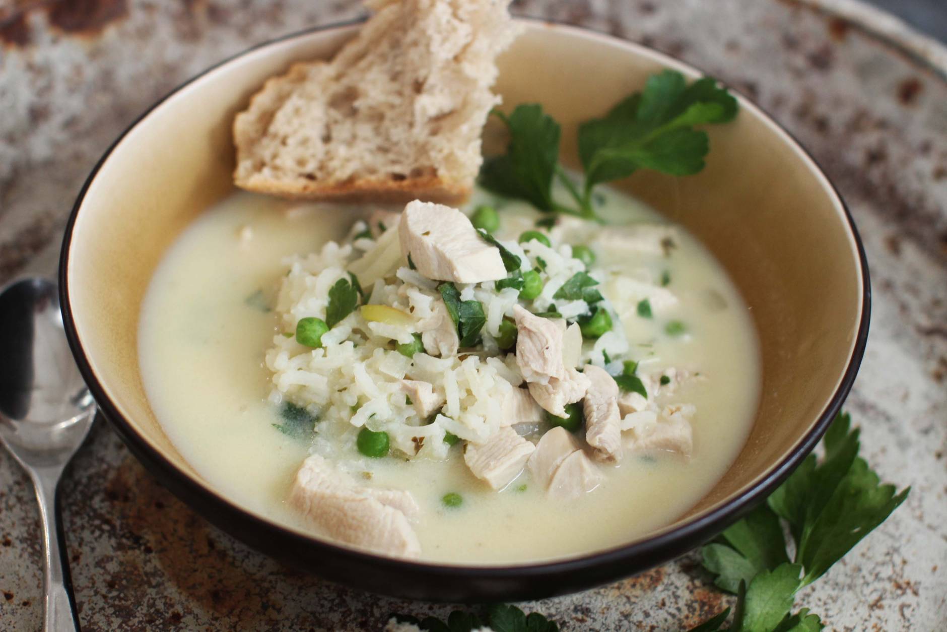 This Feb. 8, 2016 photo shows avgolemono in Concord, N.H. This Greek chicken and rice soup gets a rich thickness from eggs that are tempered, then whisked into the hot broth, creating a delicious counterpoint to the fresh flavor of the lemon juice. (AP Photo/Matthew Mead)