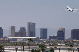A jet takes off from Sky Harbor International Airport, Friday, June 28, 2013 in Phoenix. Airlines are monitoring the soaring temperatures to make sure it's safe to fly as excessive heat engulfs much of the Desert Southwest. The heat presented problems for airlines because extreme temperatures make it difficult for smaller planes to lift off. When the air gets so hot, it becomes less dense, almost replicating thin mountain air, requiring longer runways and less fuel in the tanks to assist with takeoff. Officials said big jetliners function fine in the heat, but smaller regional carriers may have delays because of the weather.  (AP Photo/Matt York)