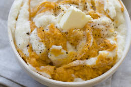 This Oct. 14, 2013 photo shows orange sweet potatoes swirled with Parmesan cauliflower puree in Concord, N.H. (AP Photo/Matthew Mead)