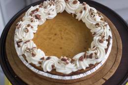 This Oct. 20, 2014 photo shows fluffy sweet potato-bourbon pie with gingered whipped cream and toasted pecans in Concord, N.H. The key to a great sweet potato pie is using fresh sweet potatoes. (AP Photo/Matthew Mead)