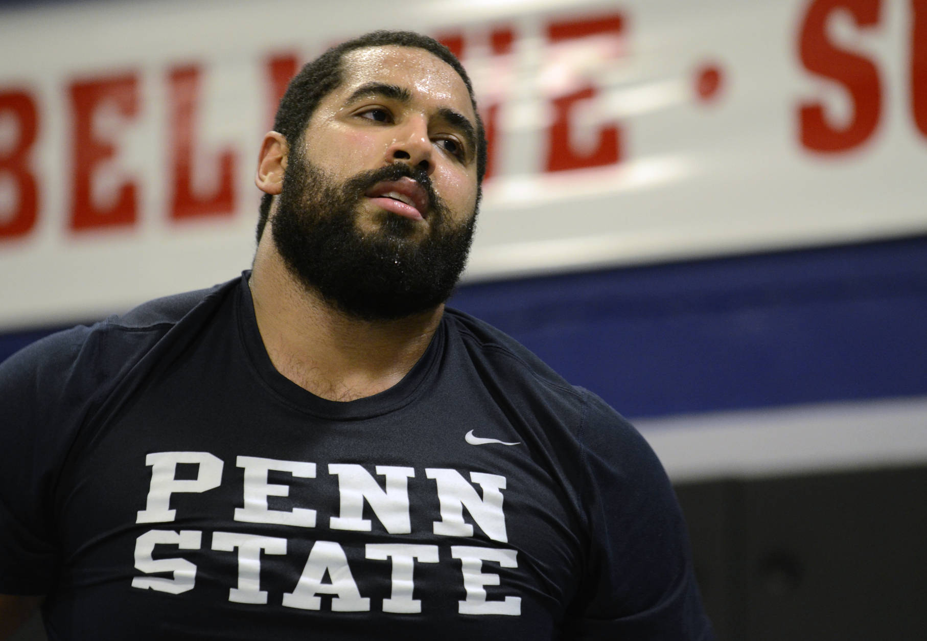 In this Tuesday, March 8, 2014 photo, Penn State lineman John Urschel takes a brief rest during a mixed martial arts workout in State College, Pa.  If it wasn't for my MMA workouts in the afternoons, I don't know how I would get all my aggression out. Football has many virtues, but for myself, I would say this is the greatest. It is a platform for me to get out all aggressive and physical behavior that is not socially acceptable outside of the gridiron. (AP Photo/Ralph Wilson)