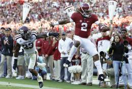 Alabama quarterback Jalen Hurts (2) jumps out of bounds after attempting a touchdown against Texas A&amp;M defensive back Armani Watts during the second half of an NCAA college football game, Saturday, Oct. 22, 2016, in Tuscaloosa, Ala. (AP Photo/Brynn Anderson)