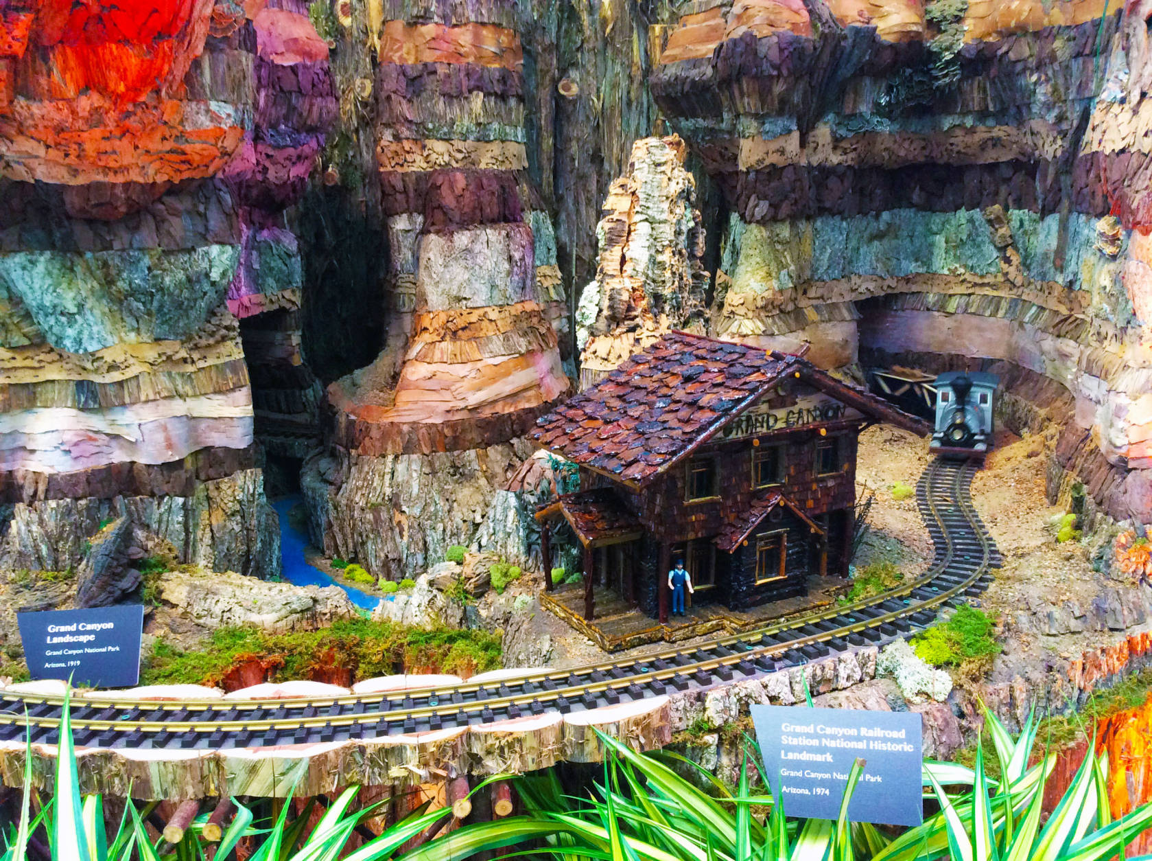 The model trains chug around more than 50 different national parks and sites, all made from plants and other natural materials. (WTOP/Hanna Choi)