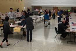 By 2:30 p.m. Va. voter turnout including absentee ballots in Langley precinct 311 is 60 percent. Chain Bridge precinct 301 is 65 percent. (WTOP/Kristi King) 