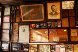 NEW YORK, NY - JANUARY 24:  Old photographs hang on a wall at McSorley's Old Ale House in a area of the East Village that the city of New York wants to declare a historic district on January 23, 2012 in New York City. The East Village has been home to famous artists, musicians and waves of immigrants from the 19th century on. It is still acknowledged as the capital of bohemia in America. Some residents and a number of the remaining churches and synagogues are fearful that renaming the area a landmark district would make any renovations prohibitively expensive. Those fighting landmark status also fear that property values would drop as any developer would be severely restricted in future renovations  (Photo by Spencer Platt/Getty Images)