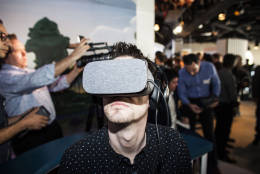 SAN FRANCISCO, CA - OCTOBER 04: A journalist uses Google's Daydream VR headset during an event to introduce Google hardware products on October 4, 2016 in San Francisco, California. Google unveils new products  including the Google Pixel Phone making a jump into the mobile device market. (Photo by Ramin Talaie/Getty Images)