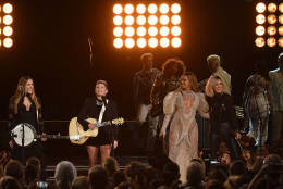 NASHVILLE, TN - NOVEMBER 02:  Beyonce (2nd R) performs onstage with Emily Robison, Natalie Maines, and Martie Maguire of Dixie Chicks at the 50th annual CMA Awards at the Bridgestone Arena on November 2, 2016 in Nashville, Tennessee.  (Photo by Rick Diamond/Getty Images)