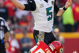 KANSAS CITY, MO - NOVEMBER 6: Quarterback Blake Bortles #5 of the Jacksonville Jaguars is brought down by outside linebacker Dee Ford #55 of the Kansas City Chiefs at Arrowhead Stadium during the second quarter of the game on November 6, 2016 in Kansas City, Missouri. (Photo by Jamie Squire/Getty Images)