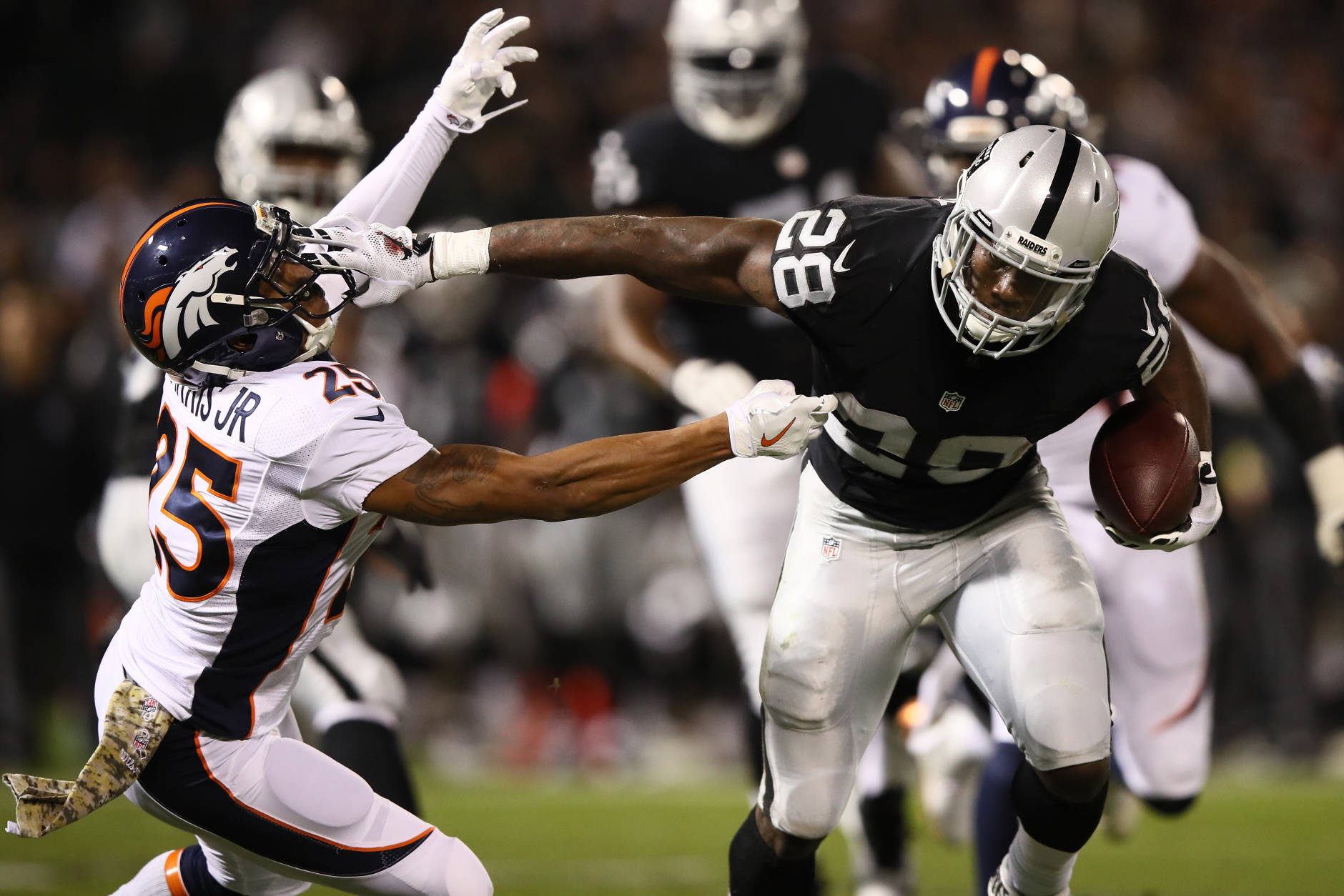 OAKLAND, CA - NOVEMBER 06:   Latavius Murray #28 of the Oakland Raiders carries the ball against the Denver Broncos at Oakland-Alameda County Coliseum on November 6, 2016 in Oakland, California. (Photo by Ezra Shaw/Getty Images)