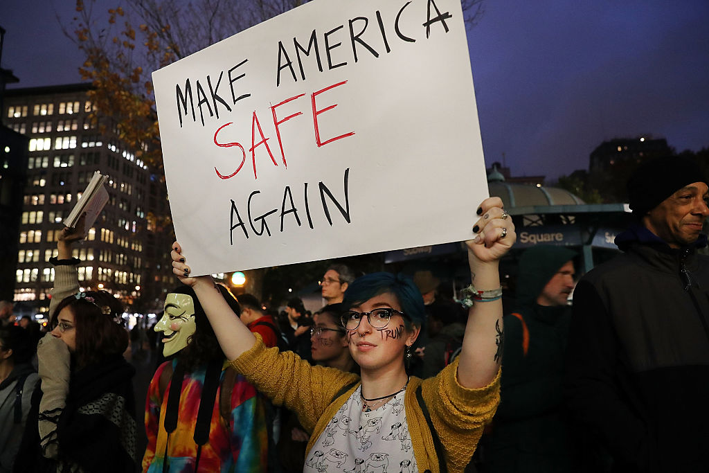 NEW YORK, NY - NOVEMBER 09: Anti-Trump protesters gather in a park as New Yorkers react to the election of Donald Trump as president of the United States on November 9, 2016 in New York City. Trump defeated Democrat Hillary Clinton in an upset to become the 45th president.  (Photo by Spencer Platt/Getty Images)