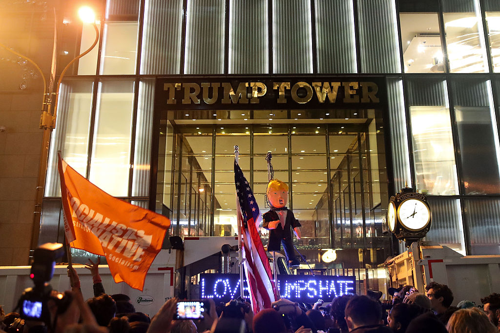 NEW YORK, NY - NOVEMBER 9: Hundreds of protestors rallying against Donald Trump gather outside of Trump Tower, November 9, 2016 in New York City. Republican candidate Donald Trump won the 2016 presidential election in the early hours of the morning in a widely unforeseen upset. (Photo by Drew Angerer/Getty Images)