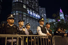 CHICAGO, IL - NOVEMBER 09: Police guard Trump Tower as protests pass by November 9, 2016 in Chicago, Illinois. Thousands of people across the United States took to the streets in protest a day after Republican Donald Trump was elected president, defeating Democrat Hillary Clinton. (Photo by John Gress/Getty Images)
