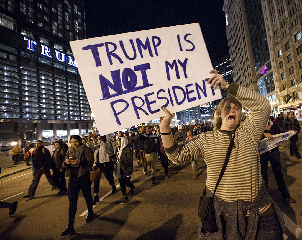 CHICAGO, IL - NOVEMBER 09: Demonstrators protest outside of the Trump Tower November 9, 2016 in Chicago, Illinois. Thousands of people across the United States took to the streets in protest a day after Republican Donald Trump was elected president, defeating Democrat Hillary Clinton. (Photo by John Gress/Getty Images)