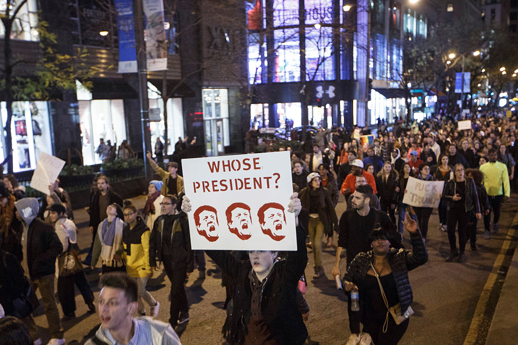 CHICAGO, IL - NOVEMBER 09: Demonstrators protest on Michigan Avenue November 9, 2016 in Chicago. Thousands of people across the USA took to the streets after Donald Trump was elected president.(Photo by John Gress/Getty Images)