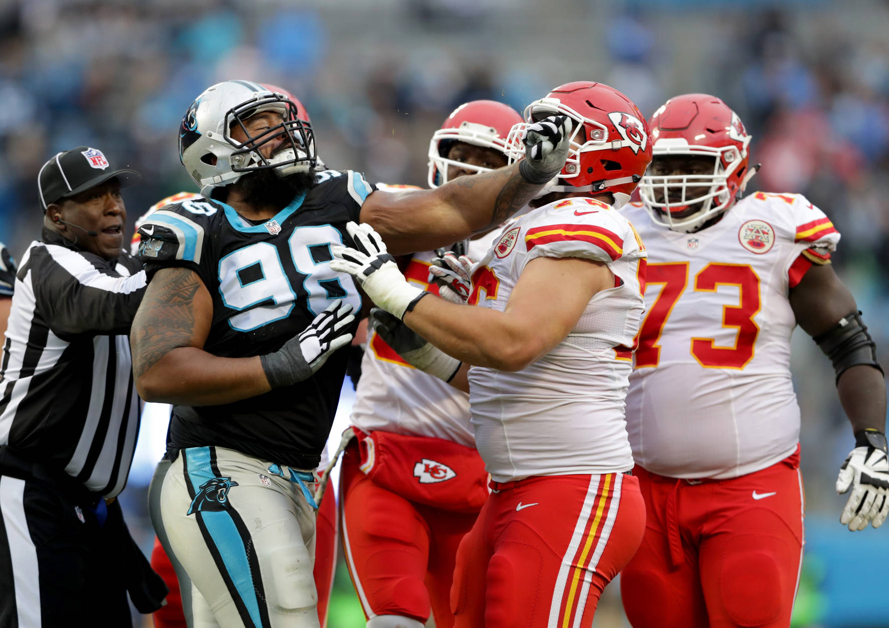 CHARLOTTE, NC - NOVEMBER 13:   Star Lotulelei #98 of the Carolina Panthers shoves  Laurent Duvernay-Tardif #76 of the Kansas City Chiefs after a play in the 4th quarter during their game at Bank of America Stadium on November 13, 2016 in Charlotte, North Carolina.  (Photo by Streeter Lecka/Getty Images)