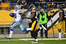 PITTSBURGH, PA - NOVEMBER 13:  Ezekiel Elliott #21 of the Dallas Cowboys rushes towards the end zone past William Gay #22 of the Pittsburgh Steelers for an 83 yard touchdown reception in the first quarter during the game at Heinz Field on November 13, 2016 in Pittsburgh, Pennsylvania. (Photo by Joe Sargent/Getty Images)