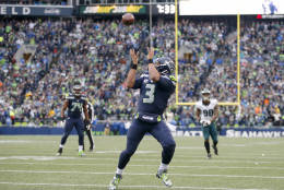 SEATTLE, WA - NOVEMBER 20:  Quarterback Russell Wilson #3 of the Seattle Seahawks scores a touchdown reception against the Philadelphia Eagles at CenturyLink Field on November 20, 2016 in Seattle, Washington.  (Photo by Otto Greule Jr/Getty Images)