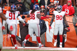 CLEVELAND, OH - NOVEMBER 27:  Jason Pierre-Paul #90 of the New York Giants celebrates his interception return for a touchdown with teammates during the fourth quarter against the Cleveland Browns at FirstEnergy Stadium on November 27, 2016 in Cleveland, Ohio. (Photo by Gregory Shamus/Getty Images)